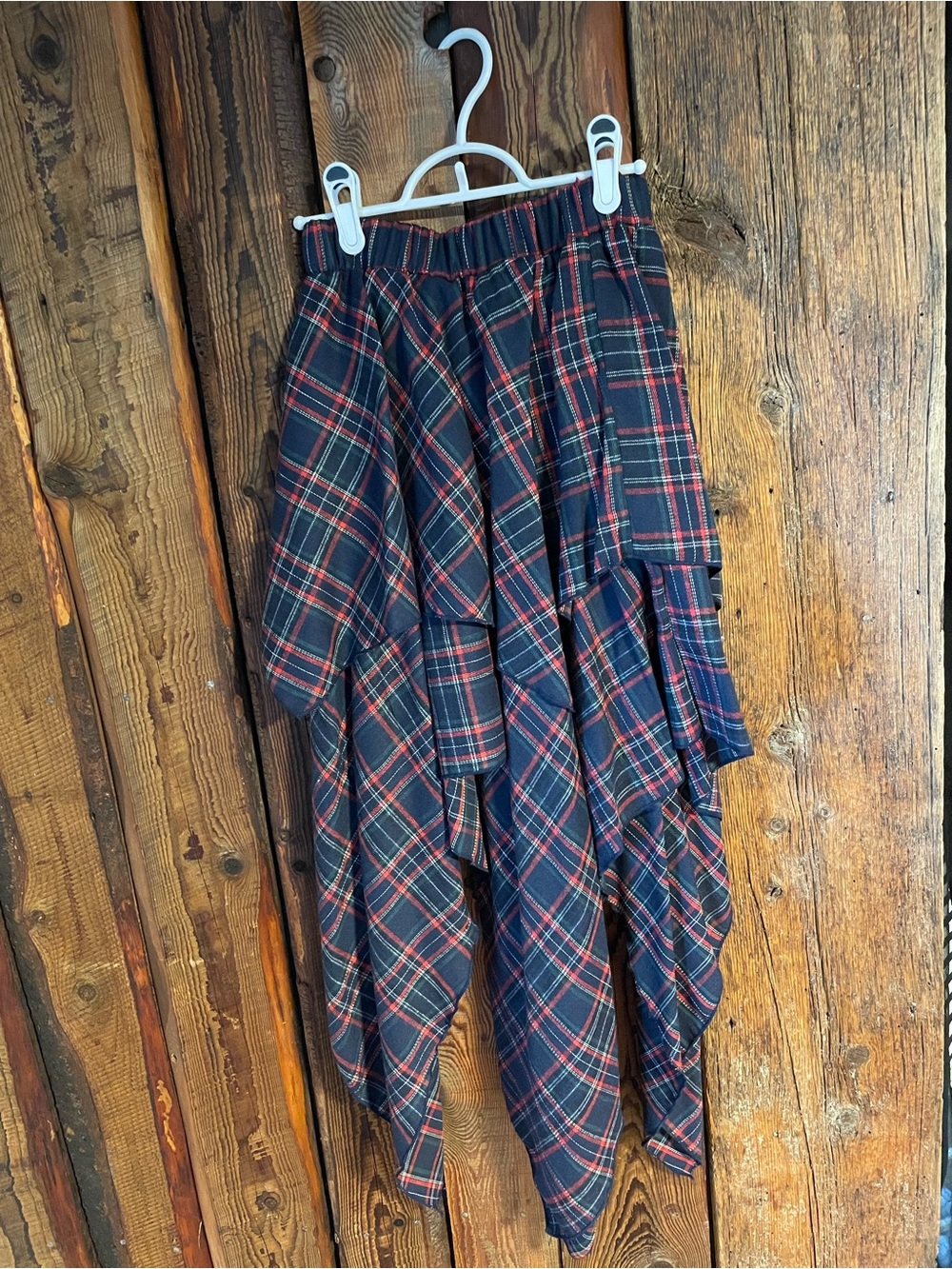 Plaid Asymmetrical Navy and Red Women's Skirt paired with a red top.